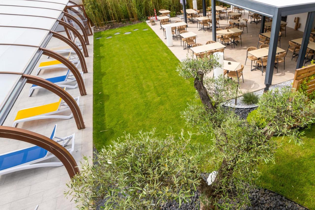 Logis Hotel Restaurant Le Clos Fleuri Castelnaudary Exterior foto